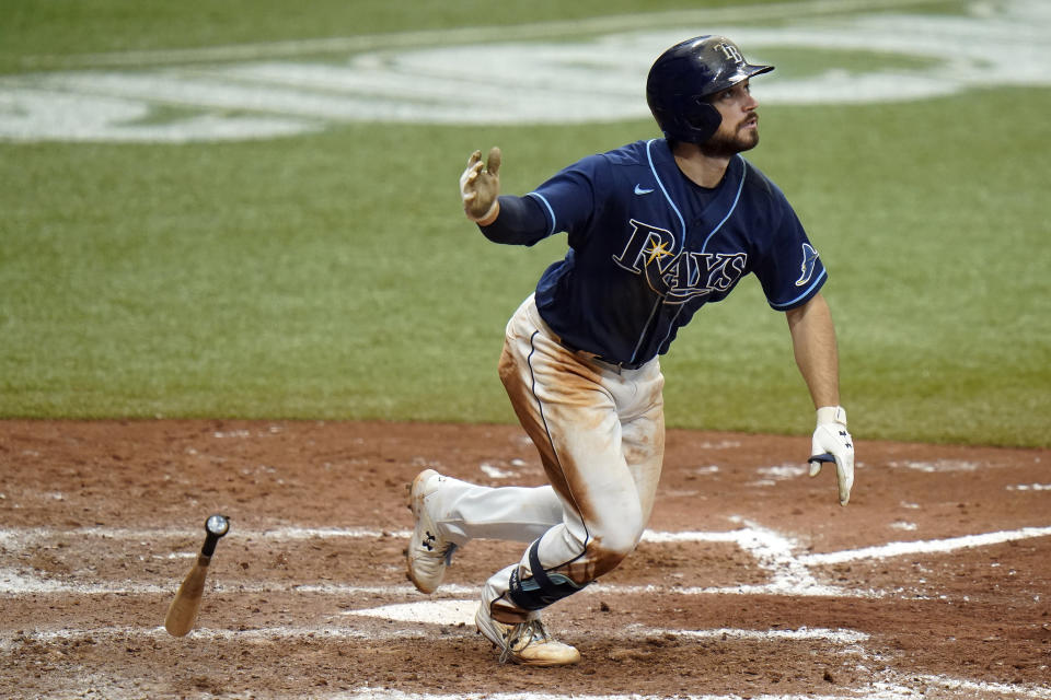 Tampa Bay Rays' Brandon Lowe reacts after hitting a solo home run off Washington Nationals relief pitcher Daniel Hudson during the ninth inning of a baseball game Wednesday, Sept. 16, 2020, in St. Petersburg, Fla. (AP Photo/Chris O'Meara)