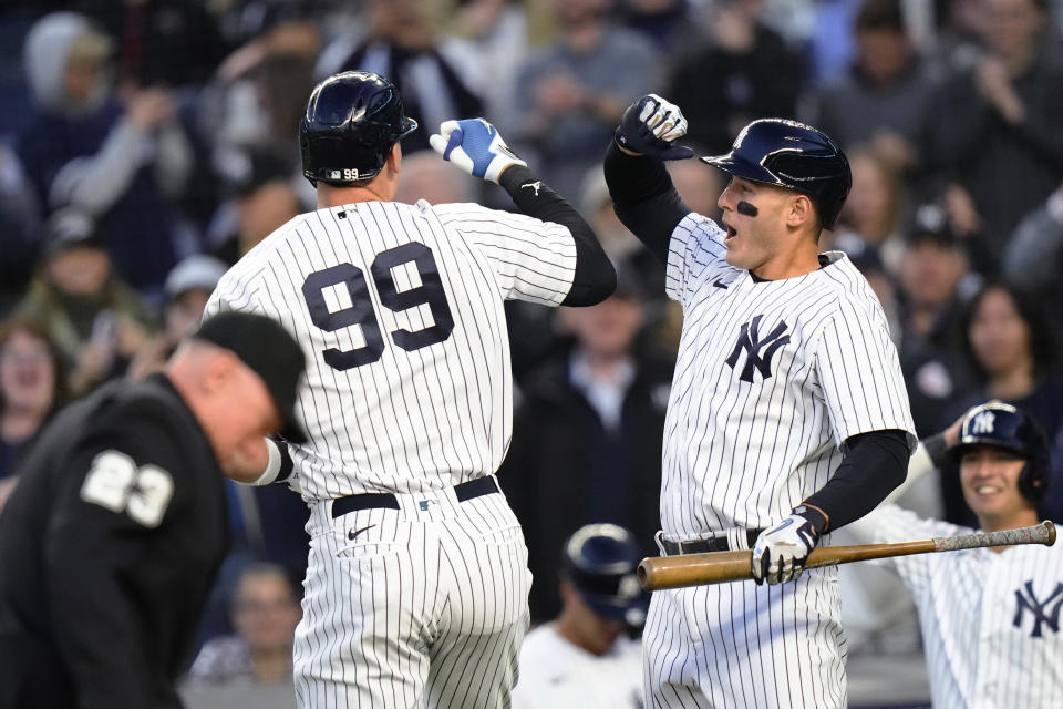 New York Yankees' Anthony Rizzo, right, celebrates with Aaron Judge after Judge hit a two-run home run against the Los Angeles Angels during the first inning of a baseball game Wednesday, April 19, 2023, in New York. (AP Photo/Frank Franklin II)