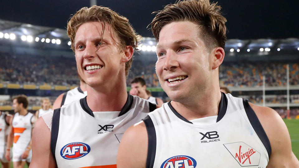 Lachie Whitfield and Toby Greene, pictured here after the Giants' semi-final win.