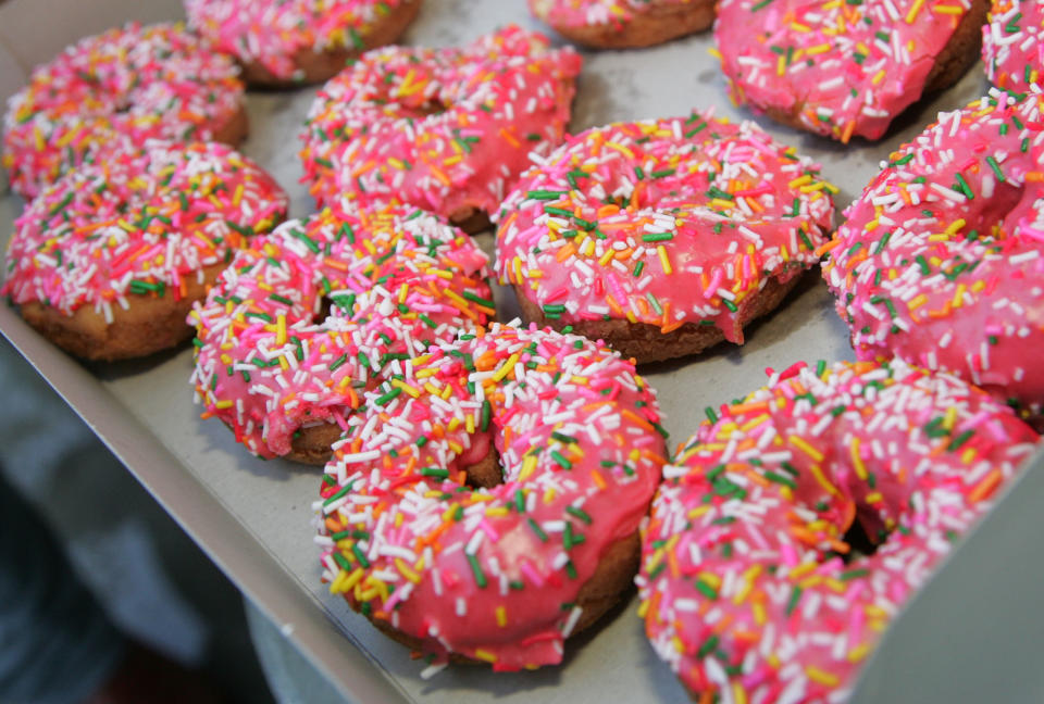 A California community buys doughnuts by the dozen so the shop’s owner can close early to spend time with his ailing wife. (Photo: Noel Vasquez/Getty Images)