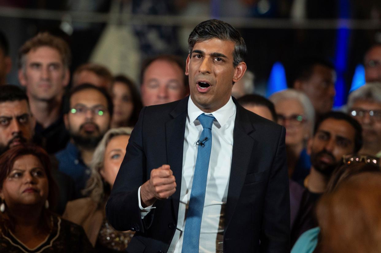 Britain's Prime Minister and Conservative Party leader, Rishi Sunak, delivers a speech at a Conservative Party campaign event at the National Army Museum in London., Tuesday, July 2, 2024. (AP Photo/Thomas Krych)