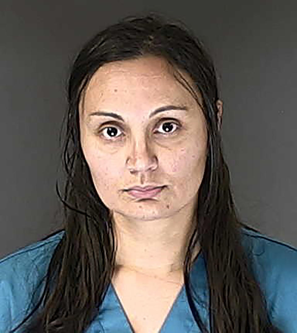 FILE - This March 5, 2020 booking photo provided by the El Paso County, Colo., Sheriff's Office shows Letecia Stauch. A prosecutor says Stauch knew what she was doing when she stabbed her young stepson 18 times and then shot him in the head before driving across the country to dump a suitcase with his remains inside over the side of a bridge in the Florida Panhandle. The statement came Monday, April 3, 2023, at the start of the murder trial of Stauch, over three years after Gannon Stauch was killed. (El Paso County Sheriff's Office via AP, File)