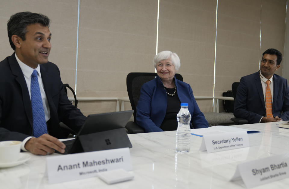 U.S. Secretary of the Treasury Janet L. Yellen, center, interacts with business leaders at the Microsoft India Development Center in Noida, on the outskirts of New Delhi, India, Friday, Nov. 11, 2022. U.S. Secretary of the Treasury Janet L. Yellen underscored the importance of establishing an Indo-Pacific economic framework that will strengthen supply chains with trusted trading partners like India as she prepared to meet Indian leaders in New Delhi, officials said Friday. (AP Photo/Manish Swarup)