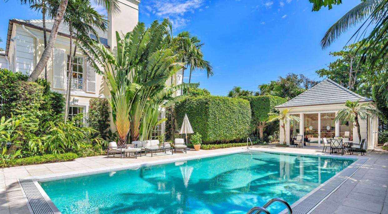 A cabana stands at one end of the pool at 120 Via Del Lago in the Estate Section of Palm Beach.