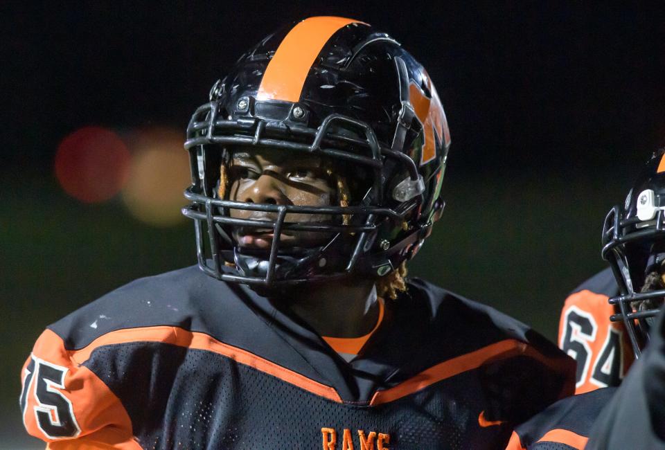 Manual senior Nas King looks toward the sideline in the first half of their Week 7 football game against Richwoods on Friday, Oct. 6, 2023 at Peoria Stadium.