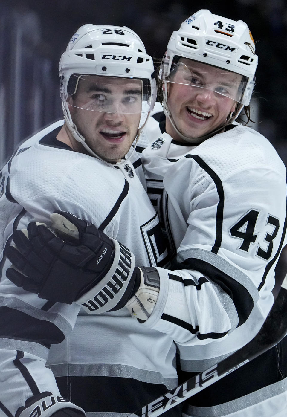 Los Angeles Kings defenseman Sean Walker (26) celebrates a goal with teammate Drake Rymsha (43) against the Colorado Avalanche during the first period of an NHL hockey game Thursday, May, 13, 2021, in Denver. (AP Photo/Jack Dempsey)