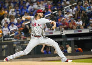 Philadelphia Phillies pitcher Aaron Nola delivers against the New York Mets during the first inning of a baseball game, Saturday, Sept. 18, 2021, in New York. (AP Photo/Mary Altaffer)