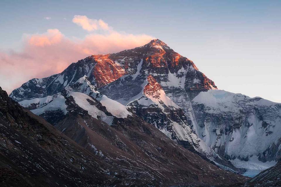 <p>Getty</p> Sunset over the Mt Everest north face from the Rongbuk Monastery