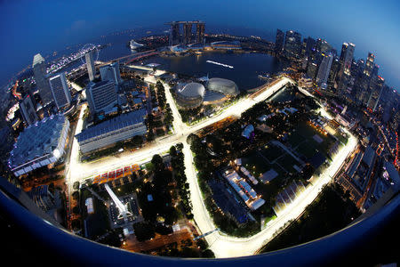 The Singapore F1 Grand Prix street circuit lights up ahead of the night race in Singapore September 14, 2017. REUTERS/Edgar Su