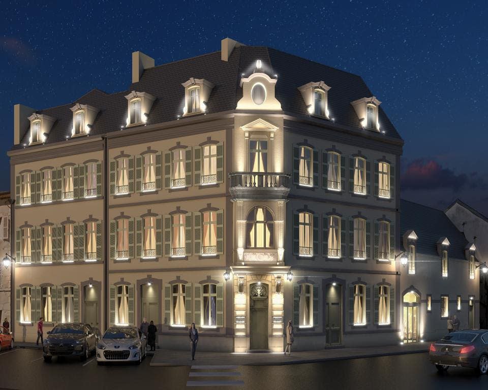 An 1896 mansion in Beaune, Burgundy, France, is illuminated with white lights at night