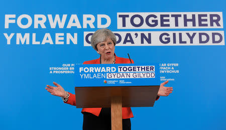 Britain's Prime Minister Theresa May speaks at an election campaign event in Wrexham, Wales, May 22, 2017. REUTERS/Toby Melville/Files