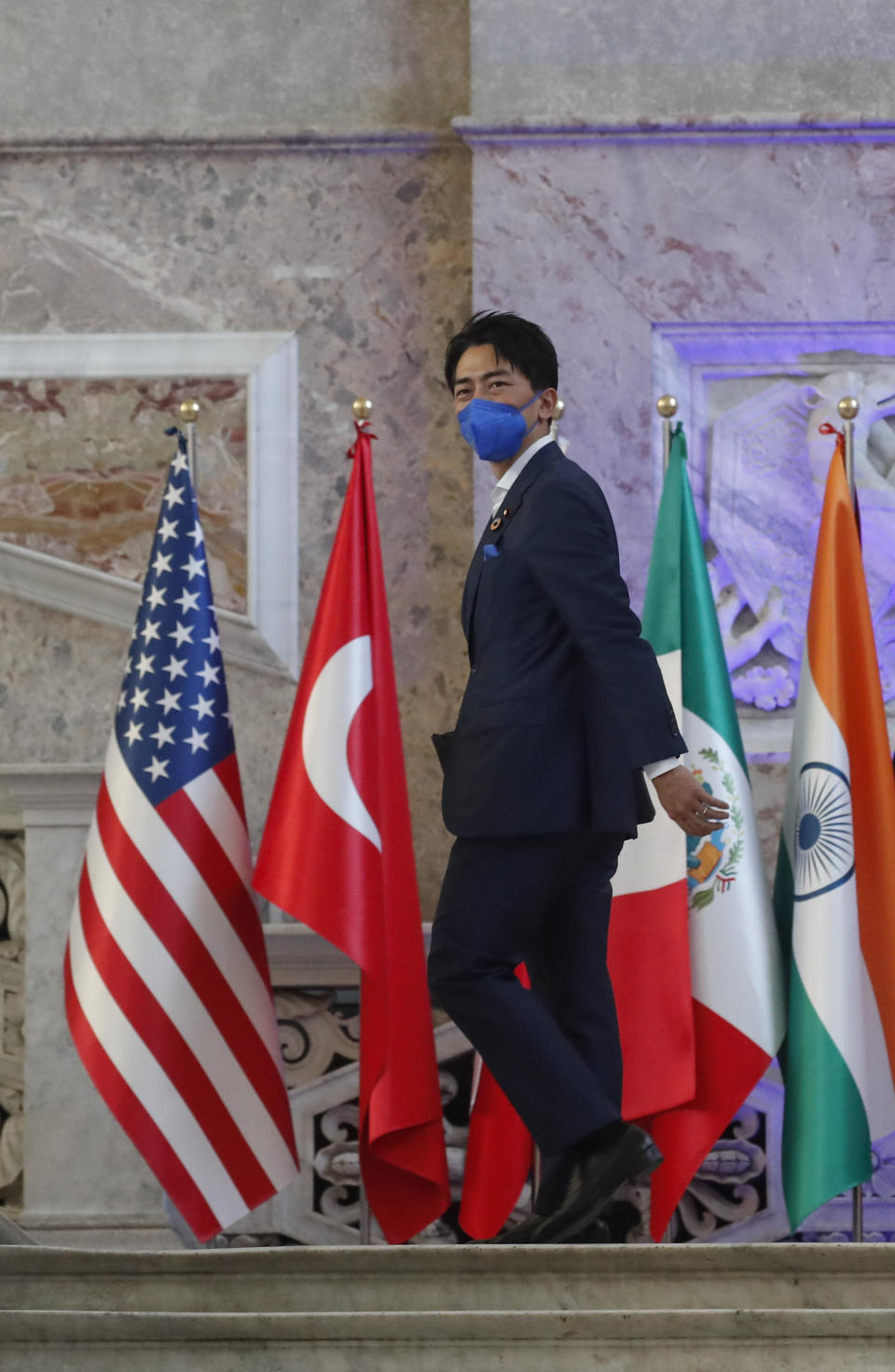 Japan's Environment Minister Shinjirō Koizumi arrives at Palazzo Reale in Naples, Italy, Thursday, July 22, 2021, to take part in a G20 meeting on environment, climate and energy. (AP Photo/Salvatore Laporta)