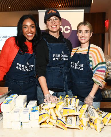 <p>Getty Images for Feeding America and Urban Outreach Center of NYC</p> Tayshia Adams, Bridget Moynahan and Emma Roberts