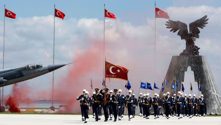 Newly graduated air force cadets march during their graduation ceremony at the Air Force war academy in Istanbul, Turkey, August 31, 2009. REUTERS/Murad Sezer/File Photo