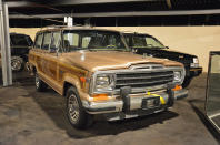 <p>This late-model Jeep Grand Wagoneer is parked next to its successor, the <strong>first-generation Grand Cherokee</strong>. It’s the ultimate evolution of the model that many historians call the first luxury SUV. The Grand Wagoneer rusted well and clean ones like the Sheikh’s sky-rocketed in value during the 2010s.</p>