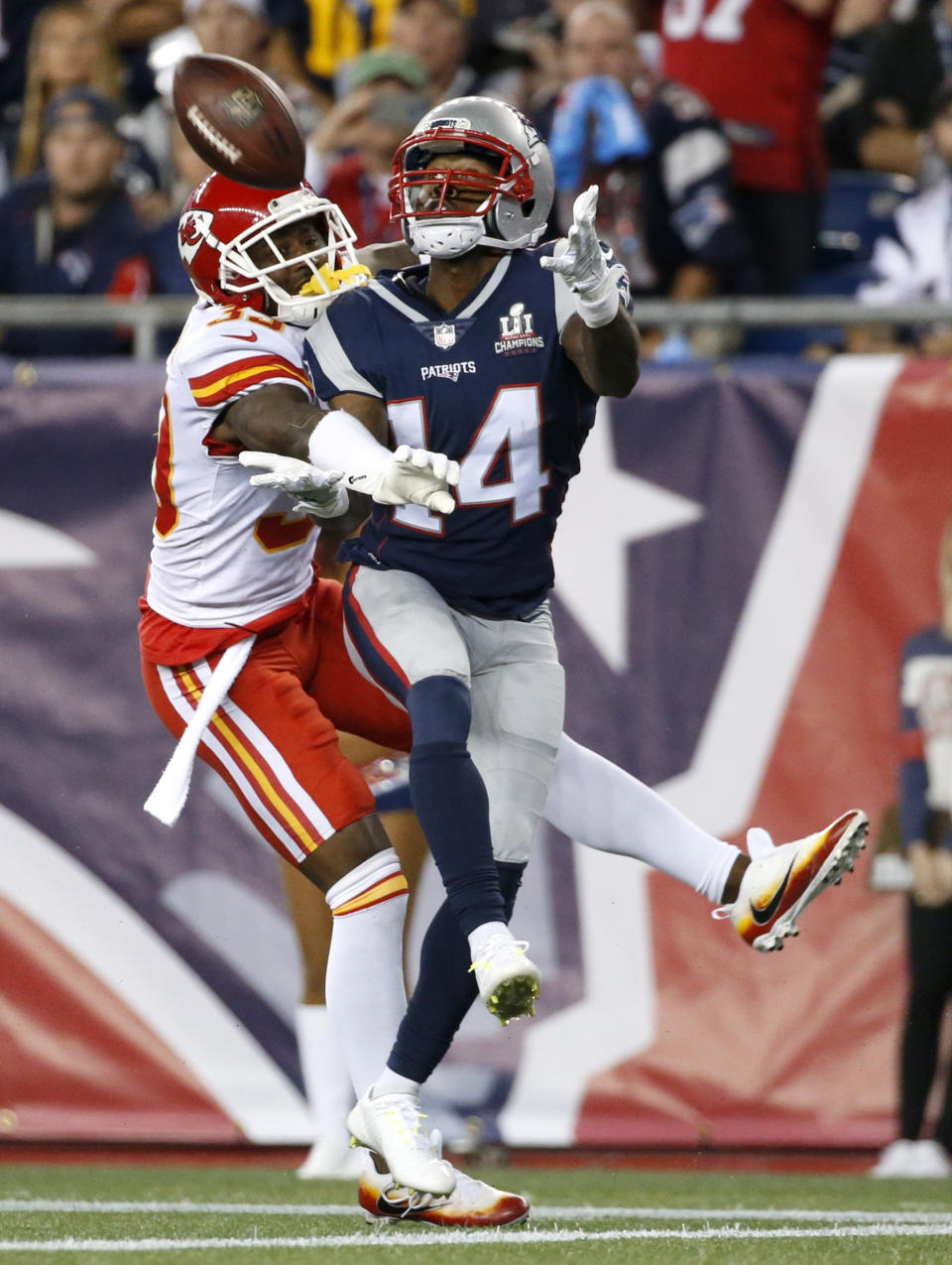 <p>Kansas City Chiefs defensive back Terrance Mitchell, left, keeps New England Patriots wide receiver Brandin Cooks (14) from catching a pass at the goal line during the second half of an NFL football game, Thursday, Sept. 7, 2017, in Foxborough, Mass. (AP Photo/Michael Dwyer) </p>