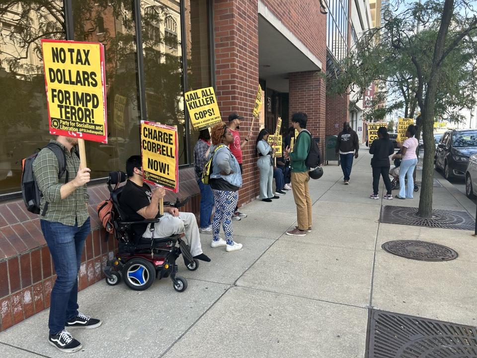 Family members of Gary Harrell, organizers with the Party for Socialism and Liberation Indianapolis and others protest outside the Marion County Prosecutor's Office on Sept. 19, 2023.