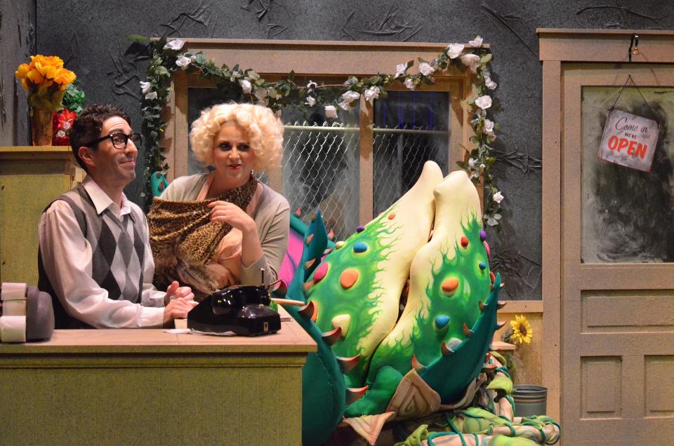 Mikey Del Vecchio as Seymour and Jamie Lynn Buechele as Audrey are pictured in a scene from "Little Shop of Horrors" at the Croswell Opera House.