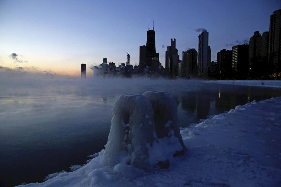 Ice forms along the shore of Lake Michigan, Wednesday, Jan. 30, 2019, in Chicago.