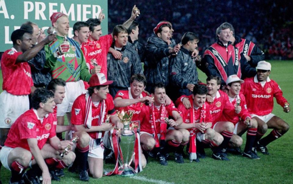 Paul Ince (farthest right) and Manchester United celebrate after winning the 1993 Premier League title.
