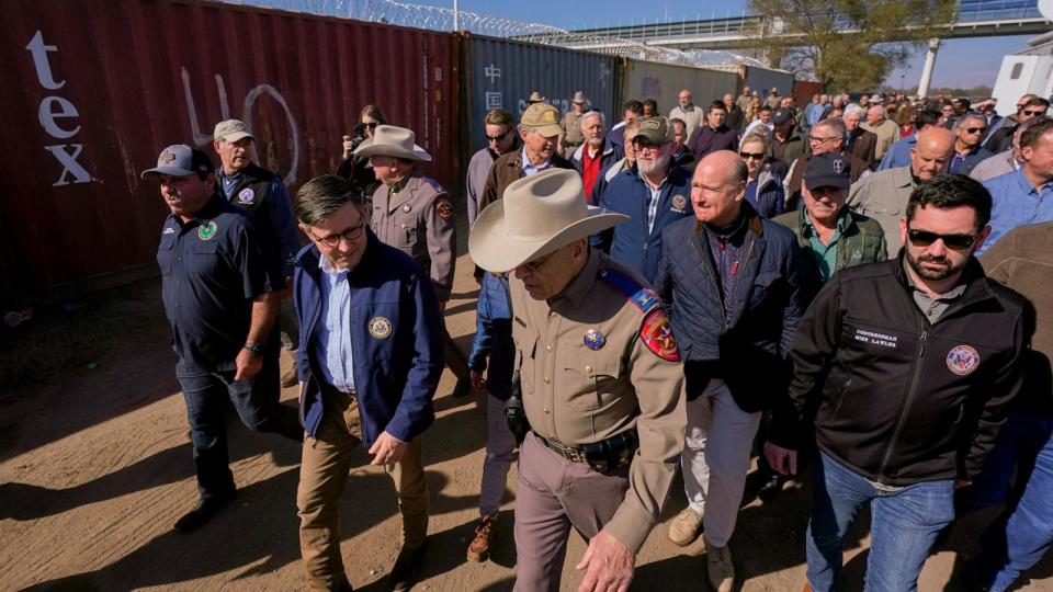 PHOTO: U.S. House Speaker Mike Johnson and Texas Department of Public Safety chief Steve McCraw lead a group of Republican members of Congress during a tour of the Texas-Mexico border, Jan. 3, 2024, in Eagle Pass, Texas.  (Eric Gay/AP)