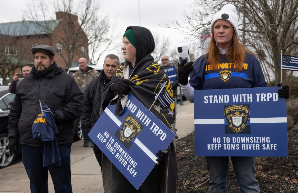 Between 80 and 90 people came out to a protest a proposed ordinance on the agenda for January 31 Township Council meeting that would eliminate two police captains jobs. During rally they were collecting signatures in an effort to invalidate the ordinance.