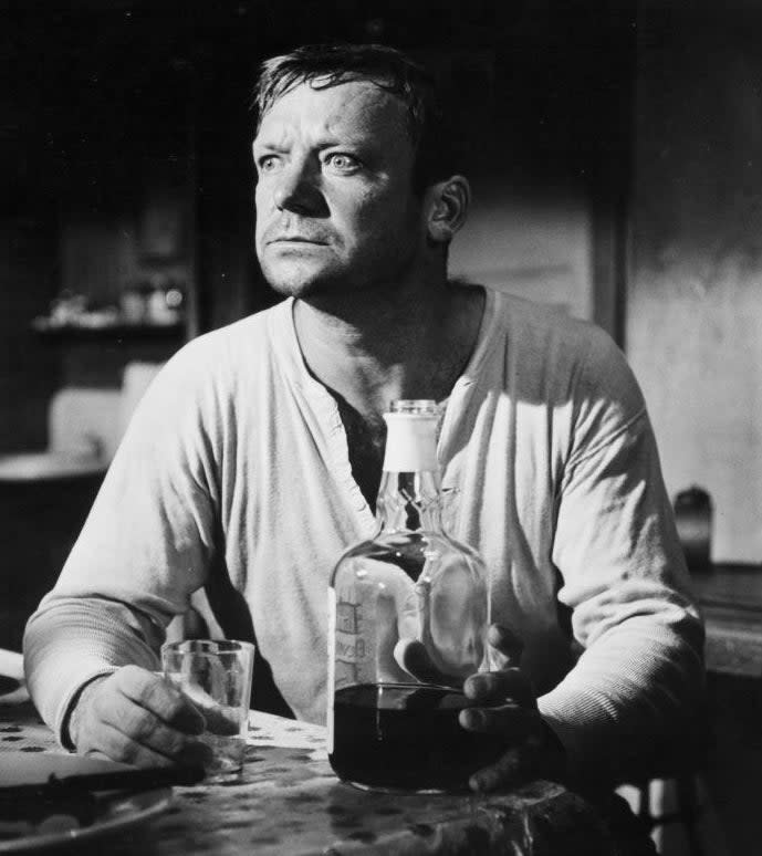 Aldo Ray drinks a bottle of booze