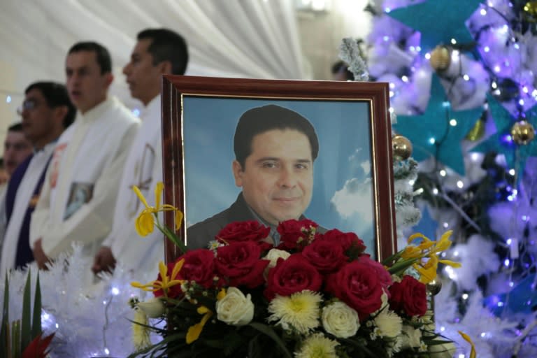 A portrait of priest Gregorio Lopez at his funeral in Altamirano, Guerrero State, Mexico, on December 26, 2014 after he was kidnapped and killed