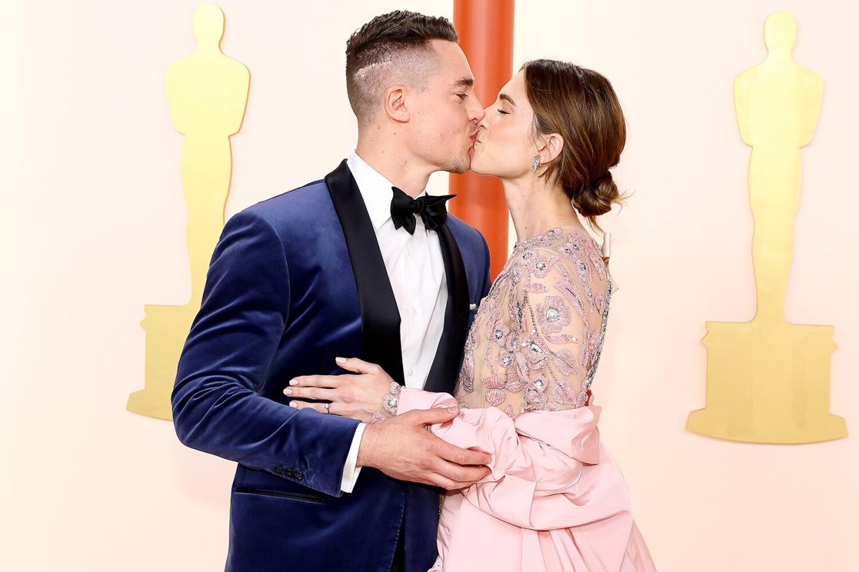 Alexander Dreymon and Allison Williams attend the 95th Annual Academy Awards on March 12, 2023 in Hollywood, California.