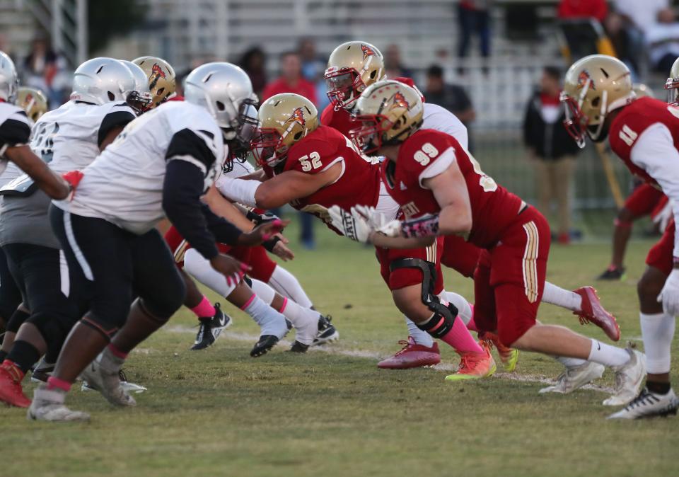 College of the Desert defensive line gets a push against Compton in Palm Desert, Calif., Oct 22, 2022.
