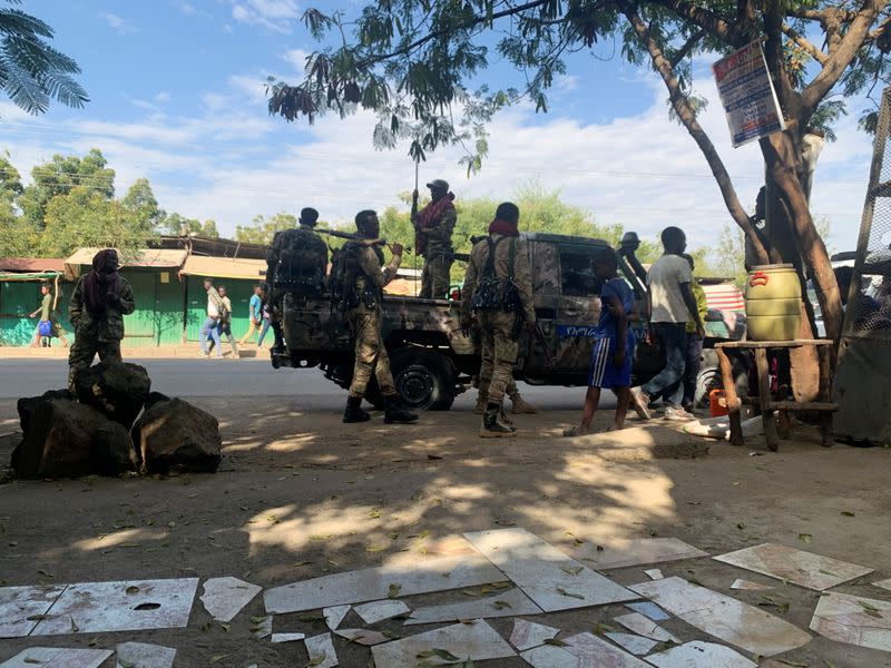 Members of Ethiopian National Defense Force prepare to head to missio, in Sanja