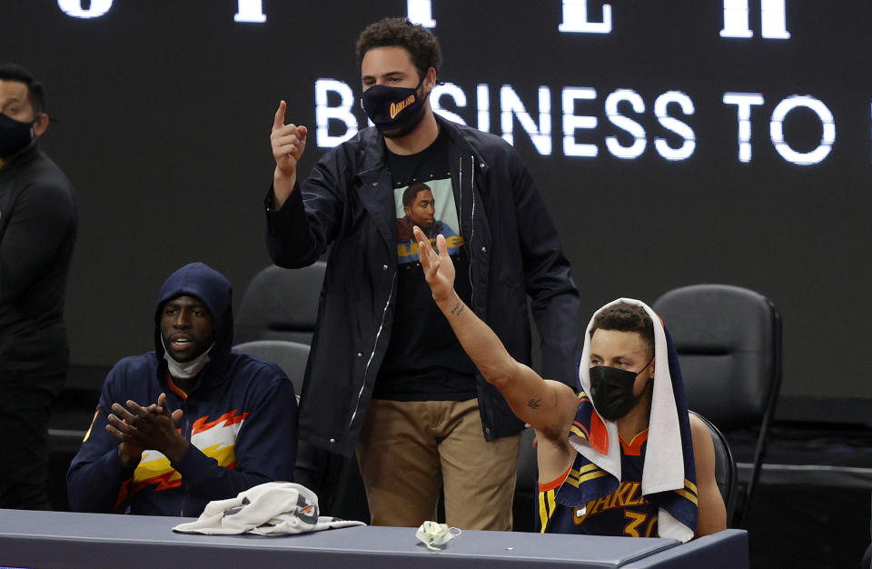 Draymond Green, Klay Thompson and Stephen Curry have not played together since Game 6 of the 2019 NBA Finals. (Ezra Shaw/Getty Images)