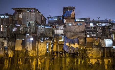 Windows of various shanties in Dharavi, one of Asia's largest slums, are seen in Mumbai January 28, 2015. REUTERS/Danish Siddiqui