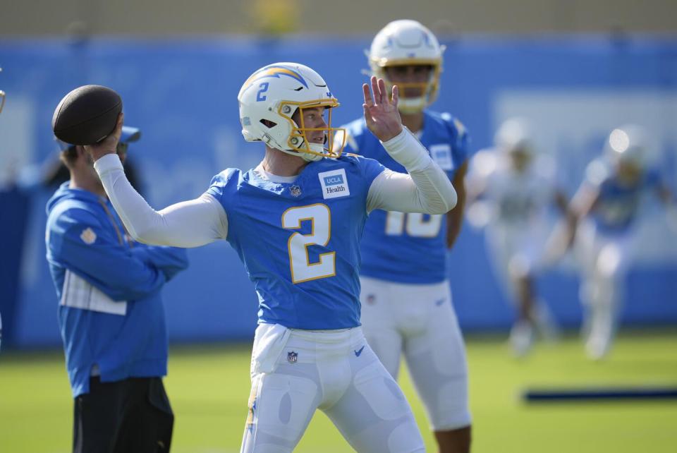 Chargers quarterback Easton Stick (2) throws during training camp.