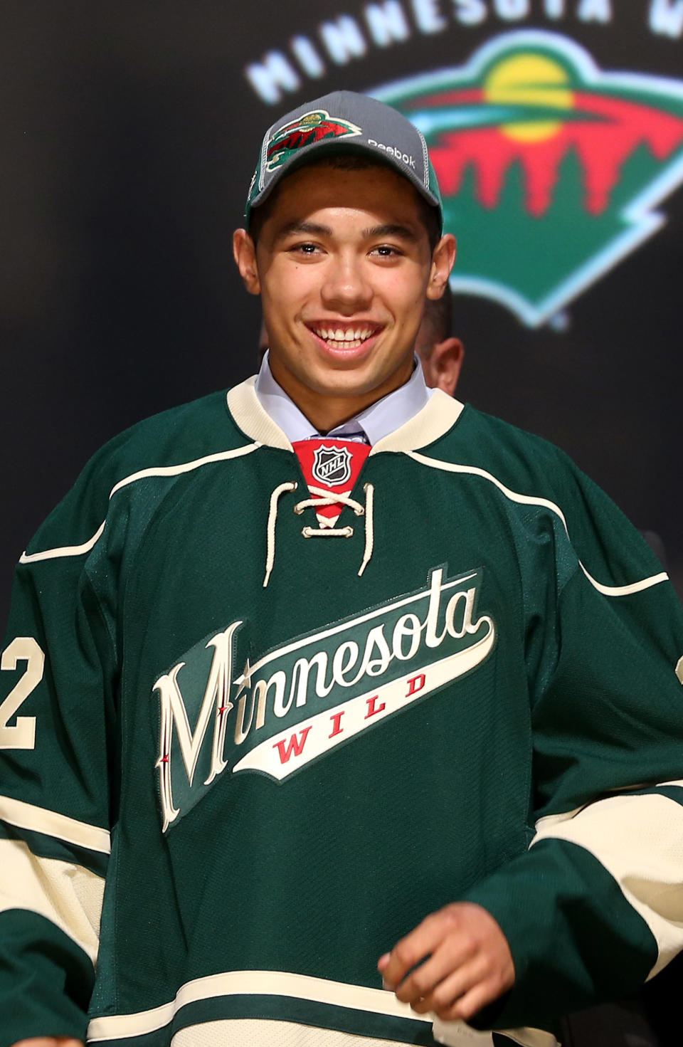 PITTSBURGH, PA - JUNE 22: Mathew Dumba, seventh overall pick by the Minnesota Wild, poses on stage during Round One of the 2012 NHL Entry Draft at Consol Energy Center on June 22, 2012 in Pittsburgh, Pennsylvania. (Photo by Bruce Bennett/Getty Images)
