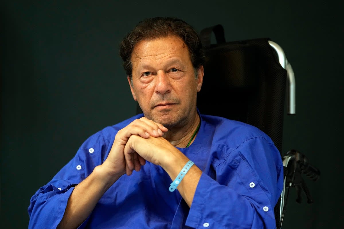Imran Khan recovering from an assassination attempt last year (AP)