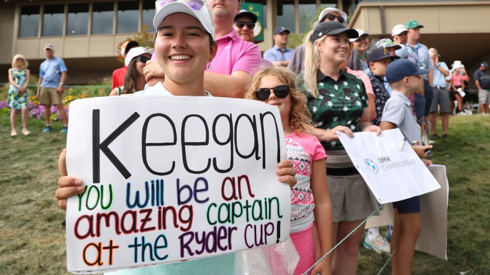 A fan holds up a sign showing support for Bradley during the final round of the BMW Championship. - Harry How/Getty Images