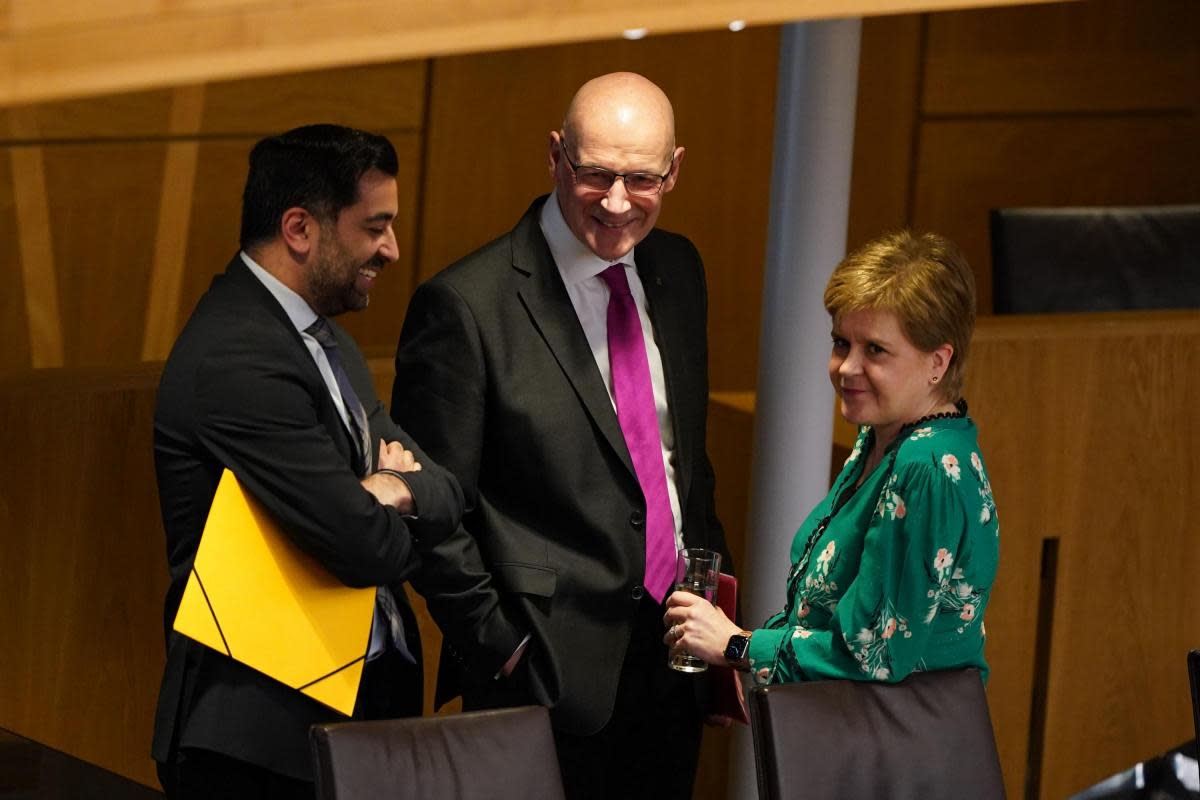 John Swinney with Humza Yousaf and Nicola Sturgeon just before the Holyrood vote that saw him appointed First Minister <i>(Image: PA)</i>