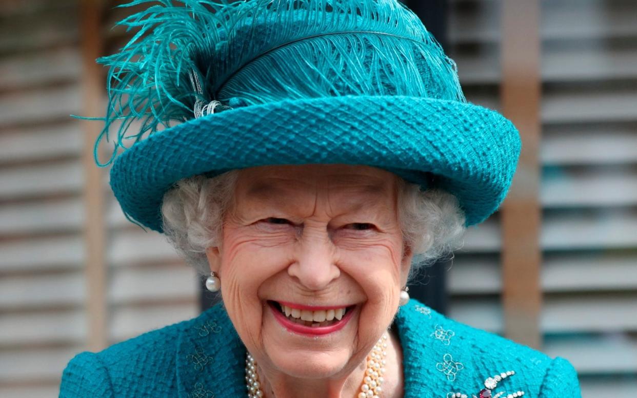 Queen Elizabeth visits the set of the long running television series Coronation Street, in Manchester - Scott Heppell/AP Photo