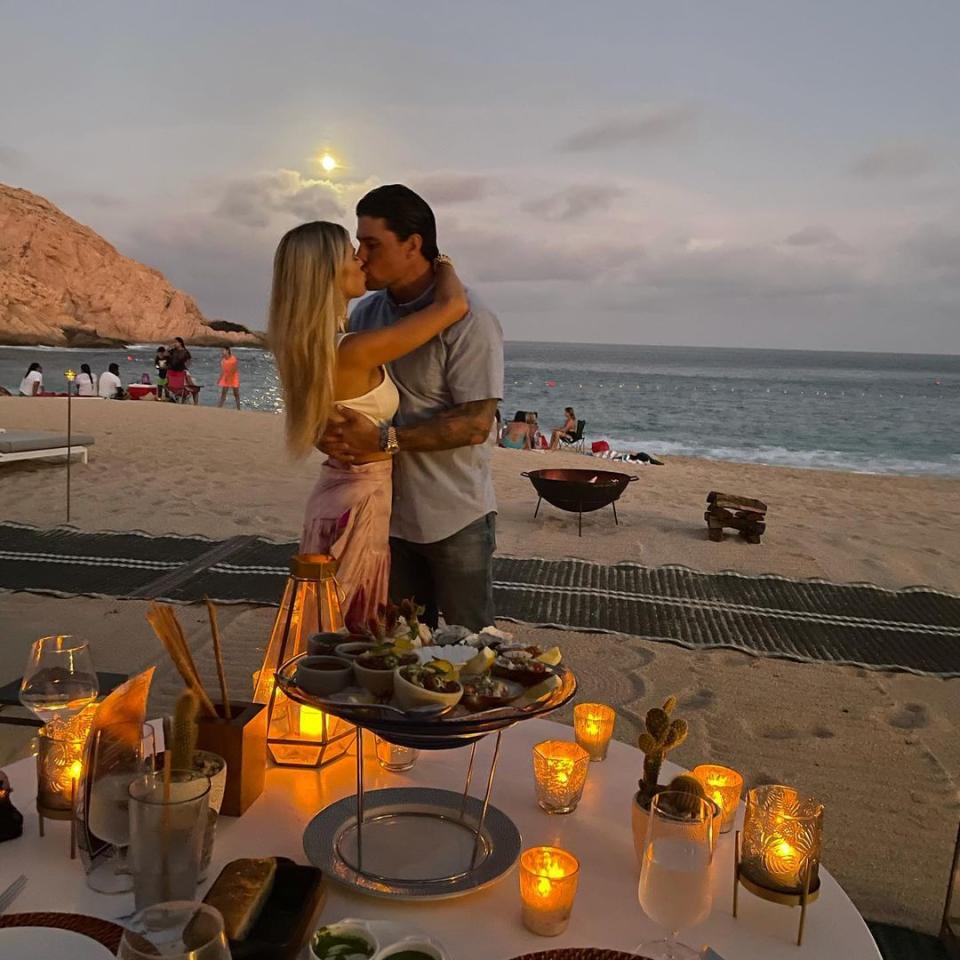 <p>In the slideshow of photos announcing their engagement, the <em>Flip or Flop </em>star shared snaps of the pair enjoying a romantic candlelit dinner in Los Cabos, Mexico. </p>