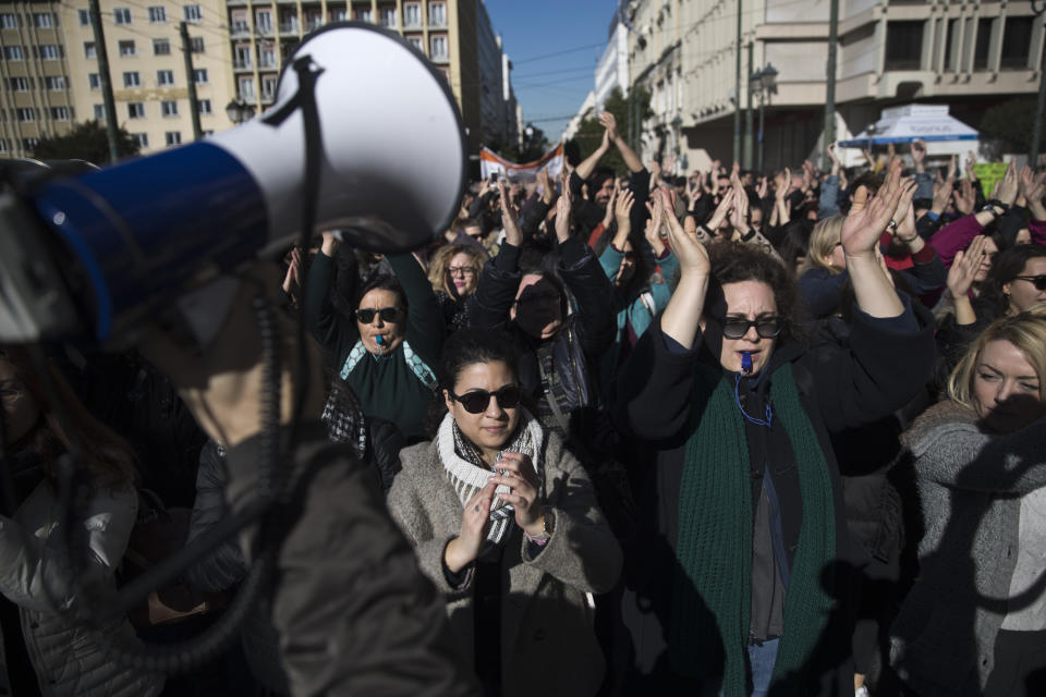 School teachers protest in central Athens, on Thursday, Jan. 17, 2019. Hundreds of striking Greek civil servants, mostly school teachers, are marching through central Athens to protest the proposed new hiring criteria for state school teachers. (AP Photo/Petros Giannakouris)