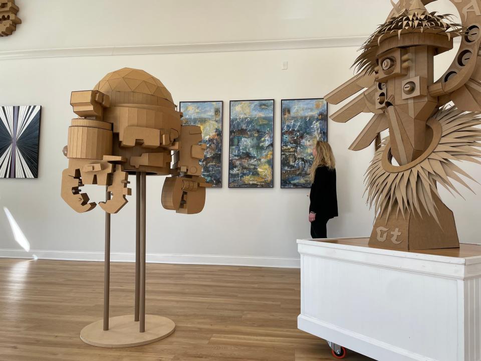 Work from Roddy Wildeman (left to right), Bradley Hoffer (cardboard), Shari Epstein and Porkchop can be seen in "UPCYCLED! Art for the Earth's Sake" at Long Branch Arts & Cultural Center.