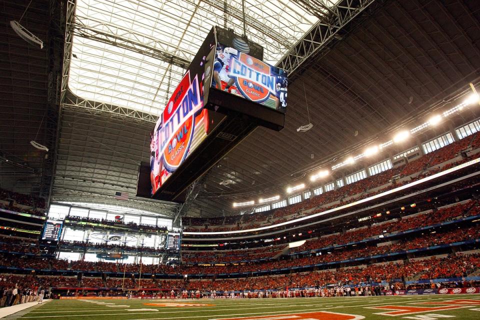 The AT&T Stadium boasts giant high-definition screens and a retractable roof (Getty Images)