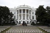 Workers prepare the South Lawn for a ceremony for U.S. President Trump to sign the United States-Mexico-Canada Agreement (USMCA) trade deal at the White House in Washington