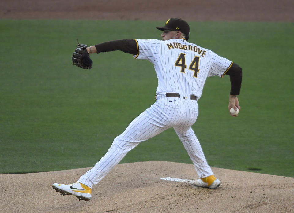 San Diego Padres starting pitcher Joe Musgrove delivers during the first inning of the team's baseball game against the Arizona Diamondbacks on Saturday, April 3, 2021, in San Diego. (AP Photo/Denis Poroy)