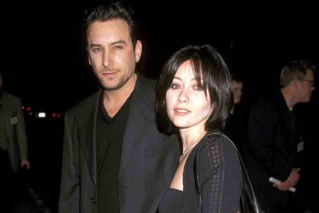 <p>Ron Galella/Ron Galella Collection via Getty</p> Shannen Doherty and Rob Weiss
