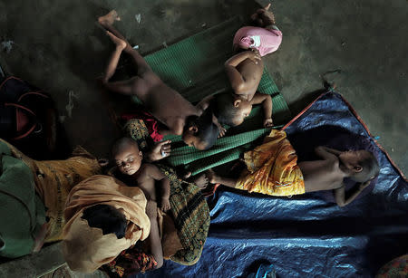 Rohingya refugee children sleep in a camp in Cox's Bazar, Bangladesh, September 21, 2017. REUTERS/Cathal McNaughton
