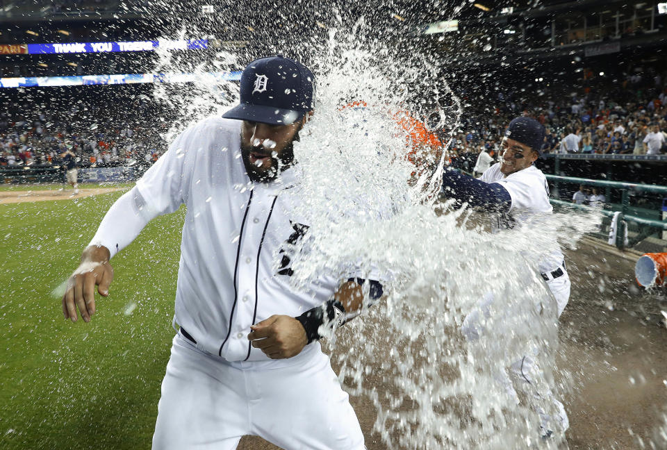 J.D. Martinez is doused with water