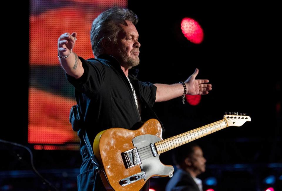 John Mellencamp acknowledges the roar of the crowd at Farm Aid at Raleigh, N.C.’s Coastal Credit Union Music Park at Walnut Creek, Saturday, Sept. 24, 2022.