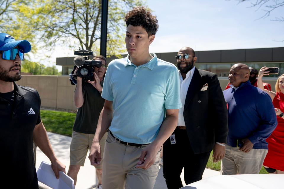 Jackson Mahomes, center, exits the Johnson County jail after being arraigned on three charges of sexual battery on May 3 in Olathe, Kansas.